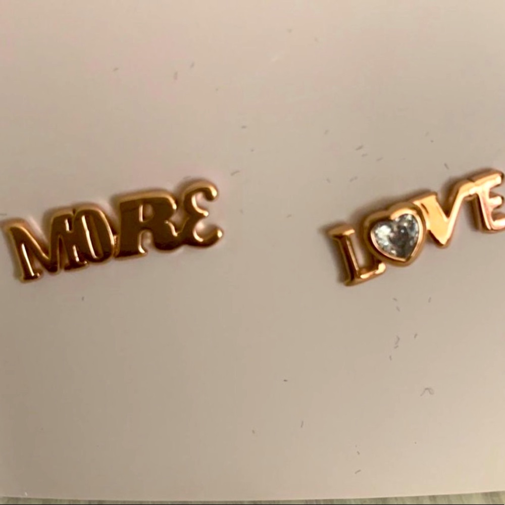 New KATE SPADE NEW YORK
Gold-Tone Cubic Zirconia "More Love" Stud Earrings - Picture 8 of 9